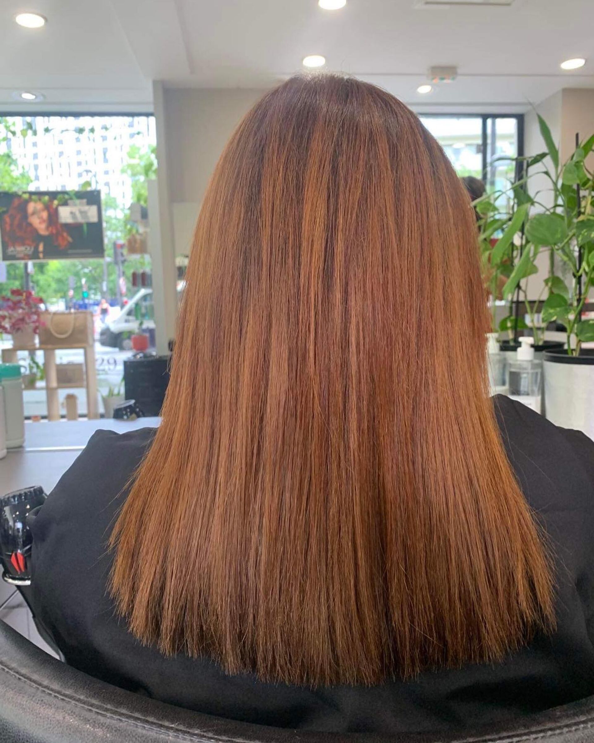 Coloration auburn longueur réalisée chez Studio 129